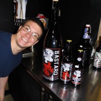 Dave next to bottles of Stone Brewery's Double Bastard